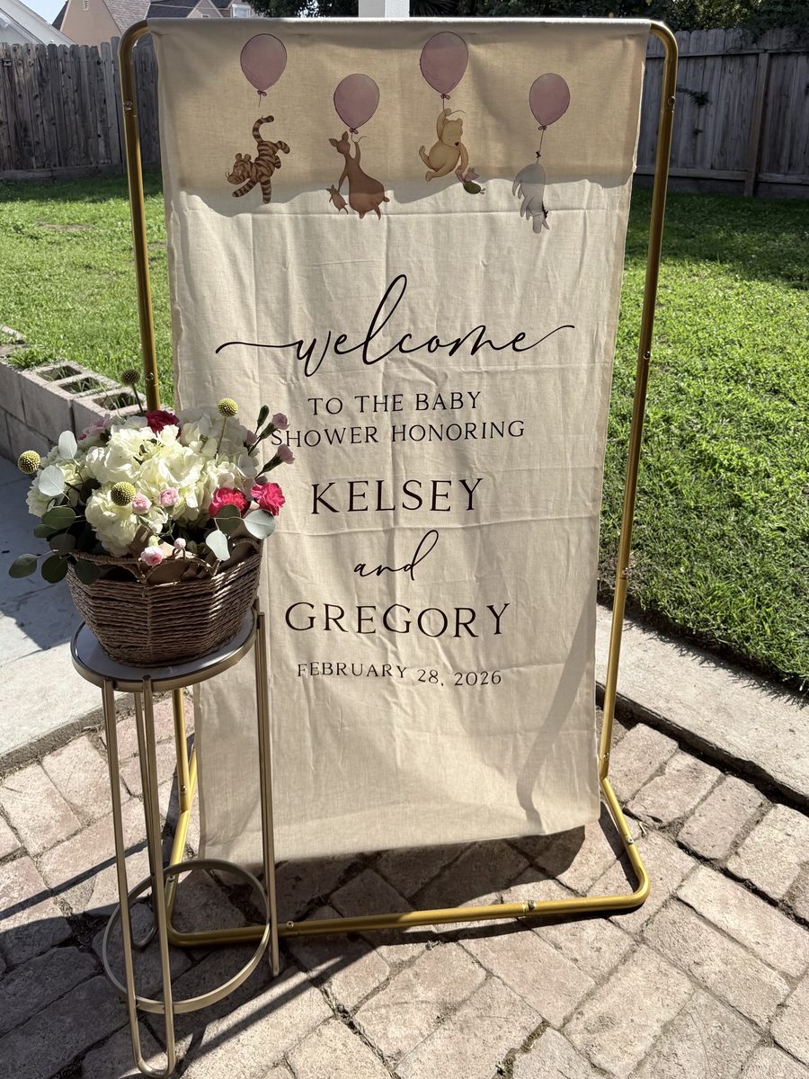 Fabric baby shower welcome banner with watercolor storybook characters and balloons