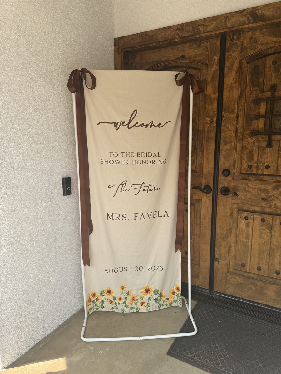 Bridal shower welcome banner with sunflowers and satin ribbon bows
