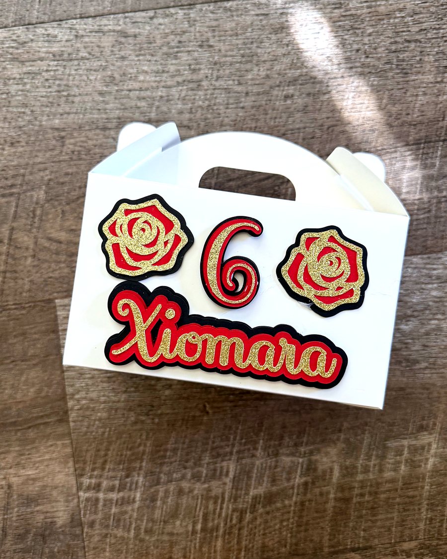 White favor box with layered 3D glitter roses, number six and the name Xiomara